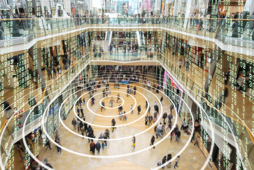 Busy shopping centre overlaid with data