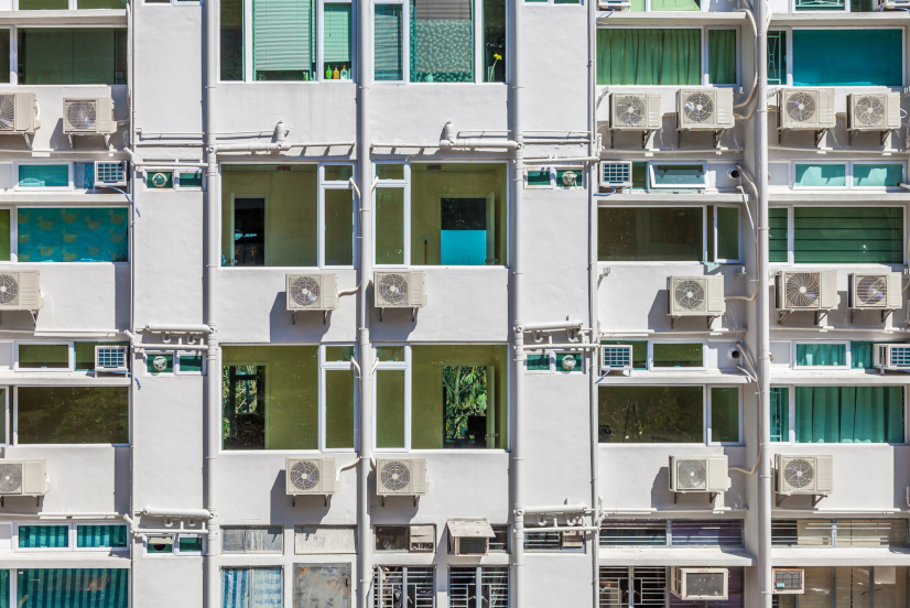 Apartment building in Hong Kong with air conditioning units on the facade